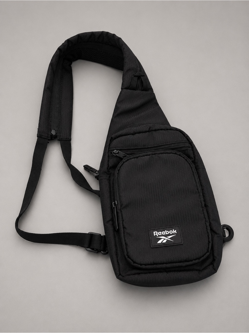 Reebok Black Men's Sling Belt Bag with Front Zip Pocket